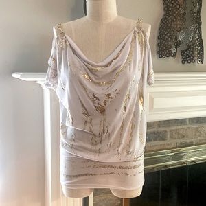 White and gold tunic